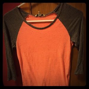 3/5 length sleeve shirt, very flattering.